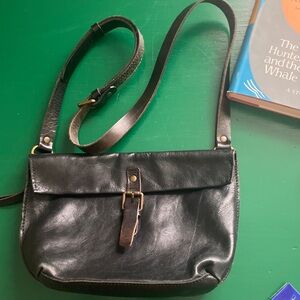 Black crossbody purse bag buckle zipper adjustable, brass vintage, worn in.